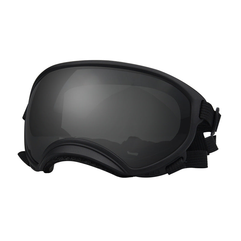 Dog goggles with black frame and smoke tinted lens, side view