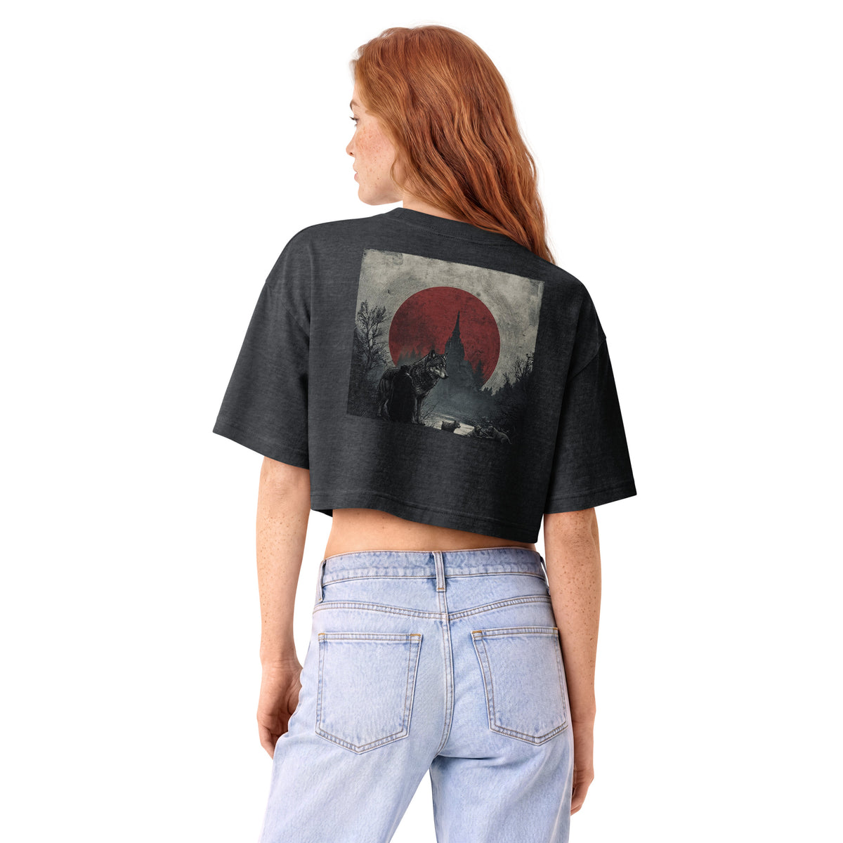 A woman wearing the washed-black Solace Cropped Tee, back view, with the full Solace artwork printed large